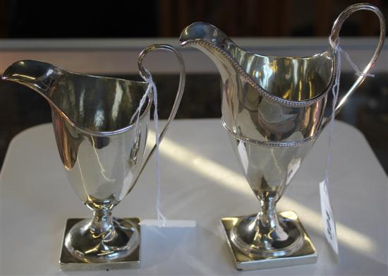 George III silver helmet-shaped cream jug & another